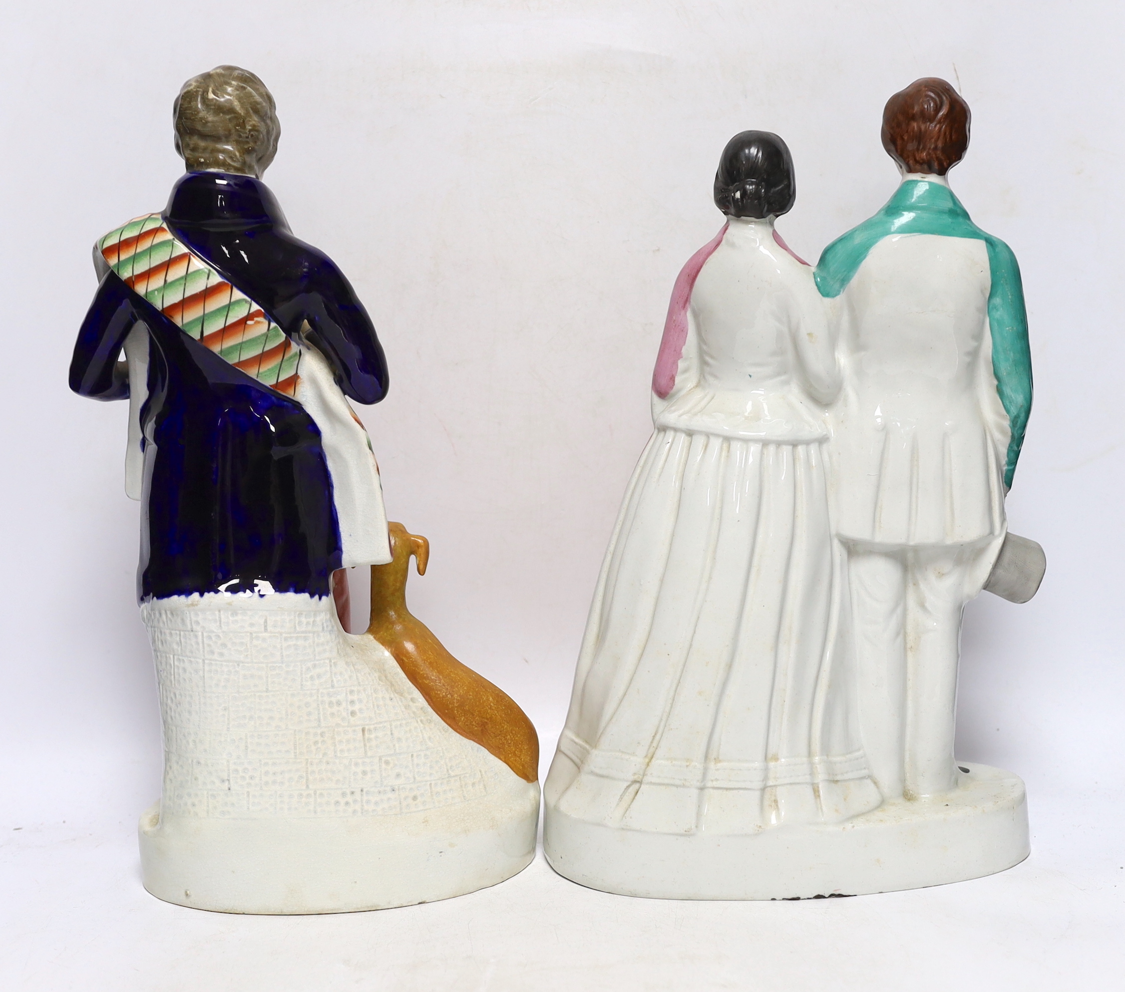 Four mid 19th century Staffordshire figure groups including Queen Victoria and Prince Albert, two individual figures of the Queen and Prince and Sir Walter Scott, tallest 36cm high